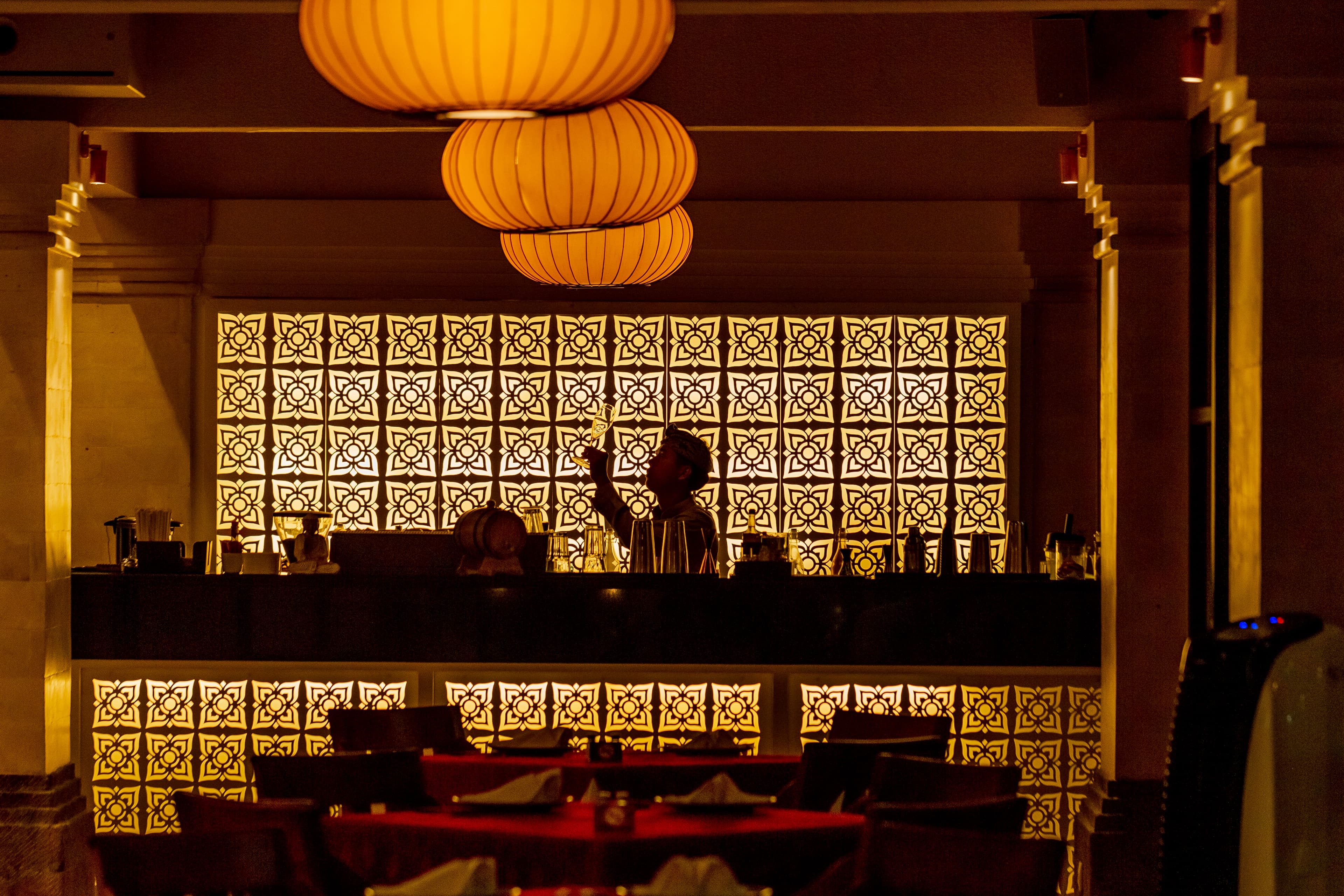 Warm bar ambience at Mezzanine in Sanur, Bali, near Sanur Beach